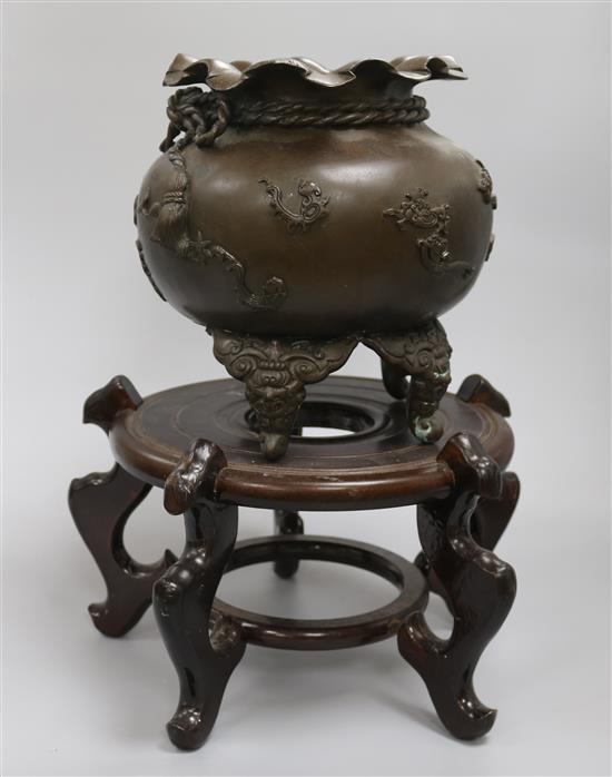 A Japanese bronze incense burner and stand